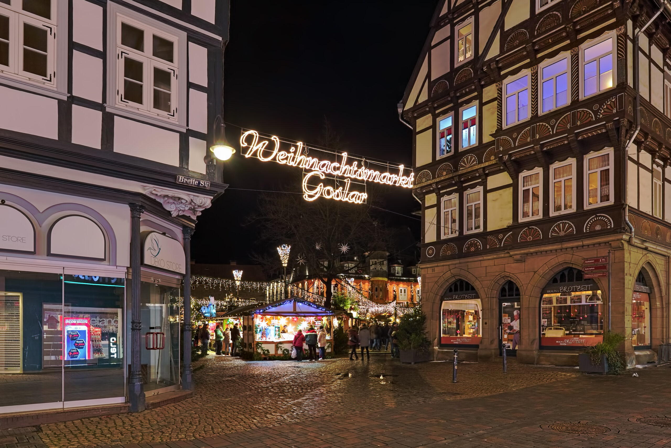 Goslar, Germany. The entrance to Christmas market at Market Square in Old Town in night.